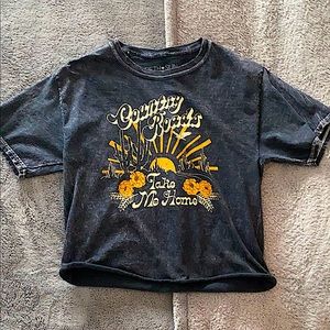 Cute T shirt with a Wild West background!